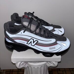 New Balance Black, White, and Red Sneakers